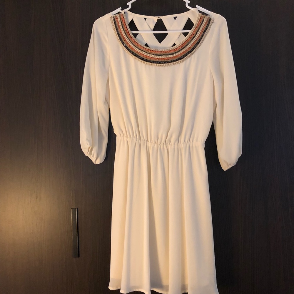Cream dress with woven open back